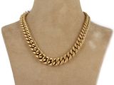 a gold chain necklace on a mannequin mannequin mannequin mannequin mannequin mannequin mannequin mannequin manne