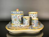 a picture of a set of three cups and saucers