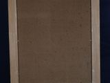 a wooden easel with a brown canvas on top of it