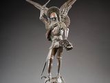 an image of a statue of an angel with a sword on a pedestal