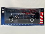an old model car in a box with an american flag on it