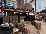 a lot of boxes and boxes on the floor in a warehouse