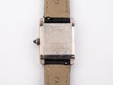 an image of a close up of a wrist watch on a white surface