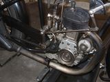 a close up of a motorcycle with a engine in the back