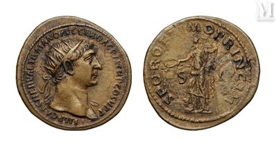 a gold coin with an image of a woman and a man on it