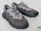 nike air footwear with laces on the soles and a logo on the sole