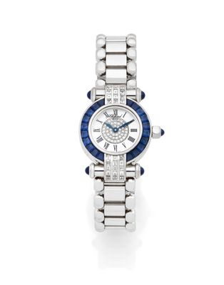 a lady ' s diamond and sapphire watch, by cartier
