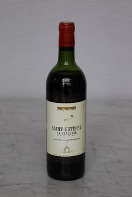 a bottle of wine that is sitting on a table