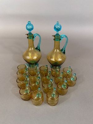 a lot of glasses that are sitting on a table