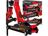 des chandelles hydrauliques rouges, avec une boîte à outils posée devant