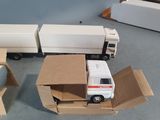 a truck that is sitting in a box on the floor