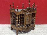 an image of a wooden candle holder with candles on top of it