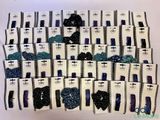 a lot of blue and black nail polishes on display