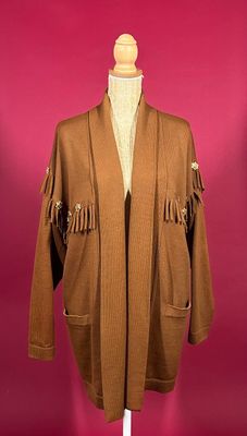 a brown jacket with fringes on a mannequin mannequin mannequin mannequin mannequin mannequin mannequin mannequin