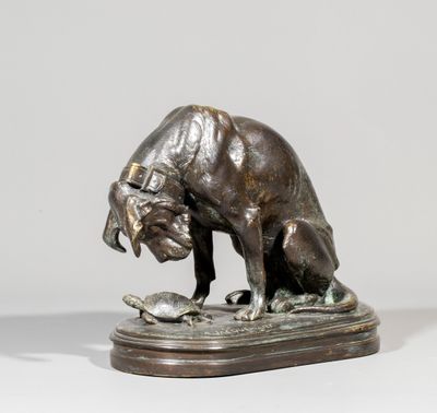 an image of a bronze statue of a dog with a fish in its mouth