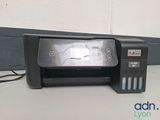 an image of a printer sitting on a desk