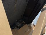 a box that is sitting in the back of a truck