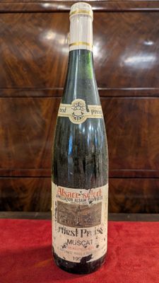 a bottle of wine that is sitting on a table