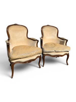 pair of louis xv style armchairs with upholstered seats
