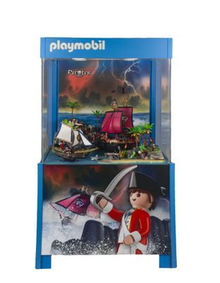 Set Playmobil sur le thème des pirates, comprenant un grand navire pirate et un petit bateau pirate