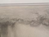 a picture of a painting on the wall of a room