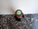 a bottle of wine that is sitting on a table