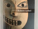 the cover of a book with an image of a mask on it