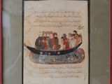 painting of a boat with people in it in a red frame