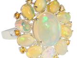 une bague en oplite et en amas de citrine, sertie de citrines et de pierres de citrine