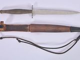 three different types of knives on a white surface