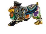 a figurine of a dog with a hat on it