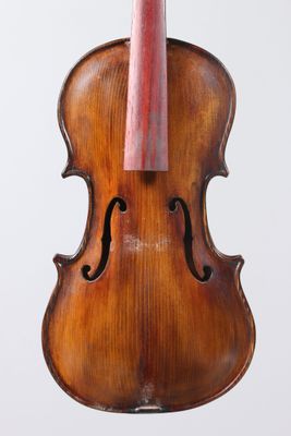 an old violin with a bow on a white background