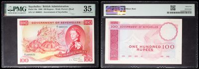 three different types of bank notes on display in a display case