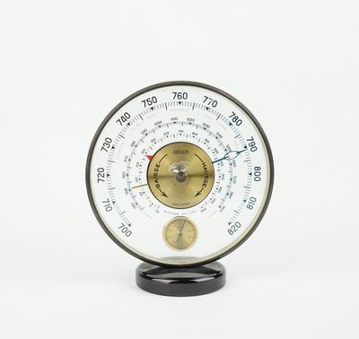 a close up of a thermometer on a white background