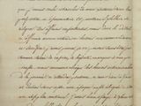 a close up of an old book with writing on it
