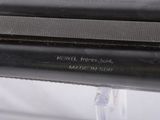 a close up of a metal object with a label on it