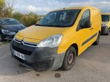 yellow citrole van parked in a parking lot next to other cars