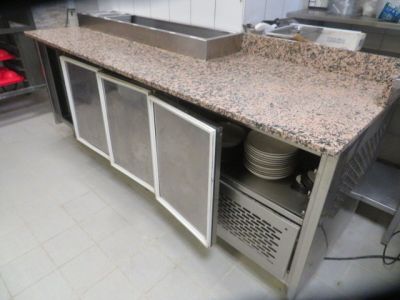 a picture of a kitchen with a sink and a counter
