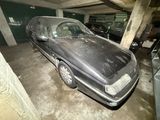 a dirty car parked in a parking garage