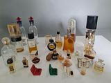 many different types of perfume bottles on a table