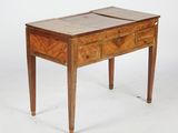 a small wooden table with a drawer on top of it