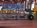 a picture of a large warehouse with a lot of shelves