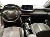 the interior of a car with a steering wheel, dashboard, and dashboard controls