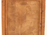 an old wooden picture frame with a picture of a woman on it