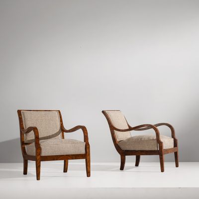 pair of armchairs in the manner of person