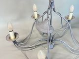 an image of a chandelier with five lights