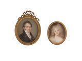 deux portraits miniatures représentant un homme et une femme, dans un cadre doré