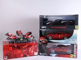 une boîte contenant une petite voiture rouge et une boîte contenant une petite voiture rouge