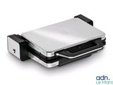 a laptop that is sitting on top of a stand