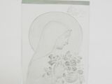 a glass block with a picture of a woman and flowers on it